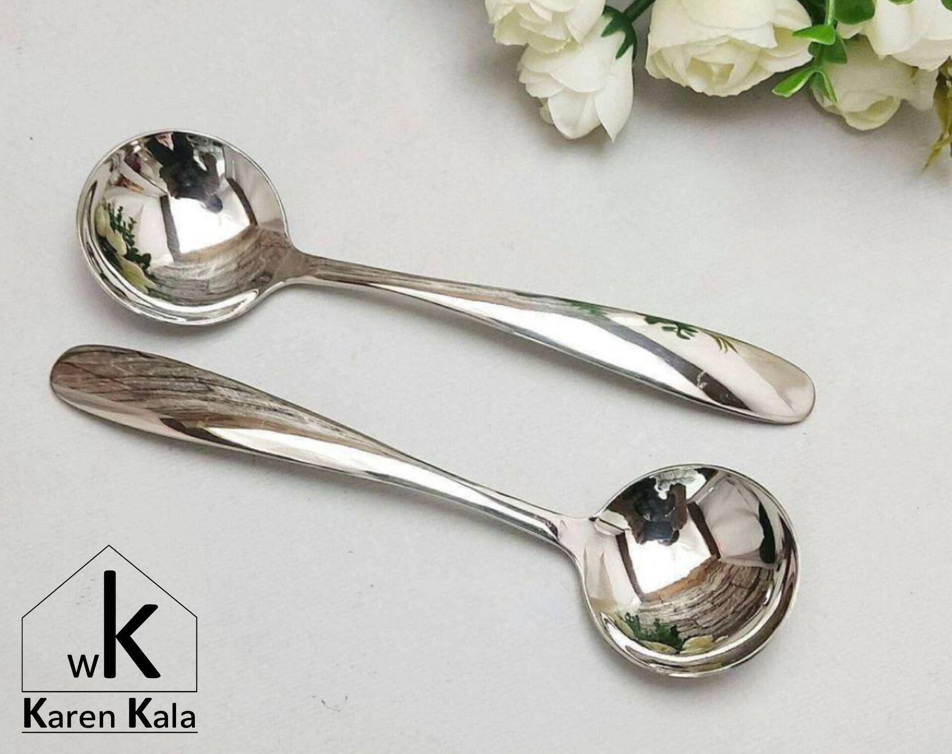 ملاقه خورشت خوری نقره‌ای